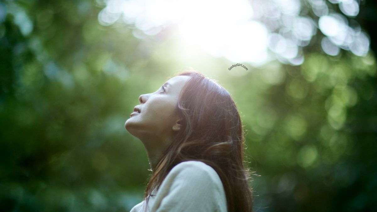 a woman looking up to the sky